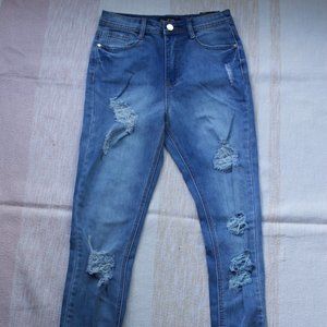 Distressed denim high rise skinny jeans